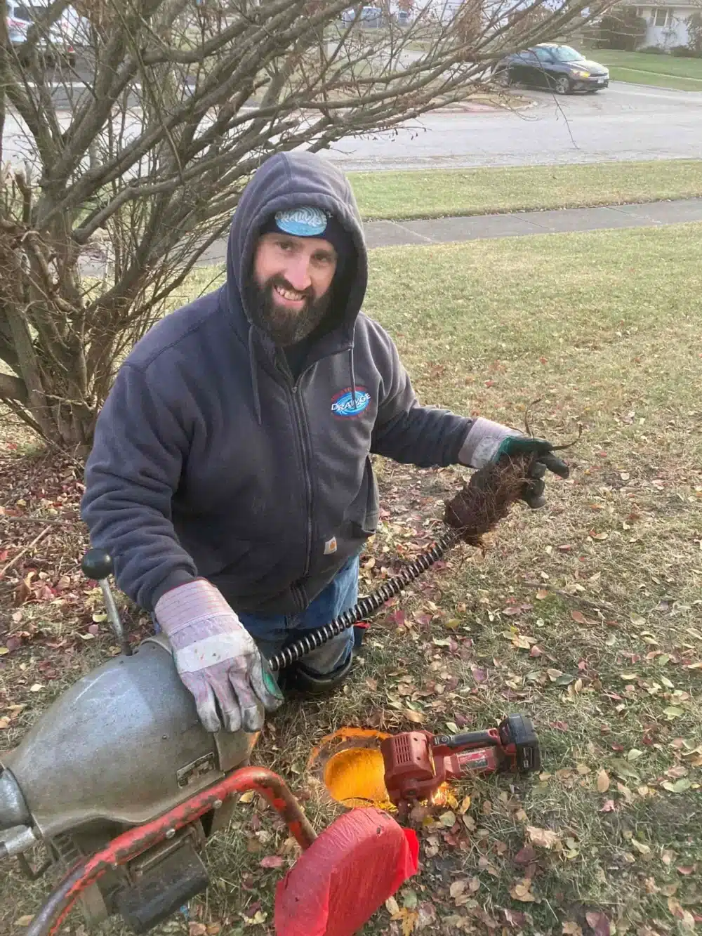 technician performing sewer rodding in crete
