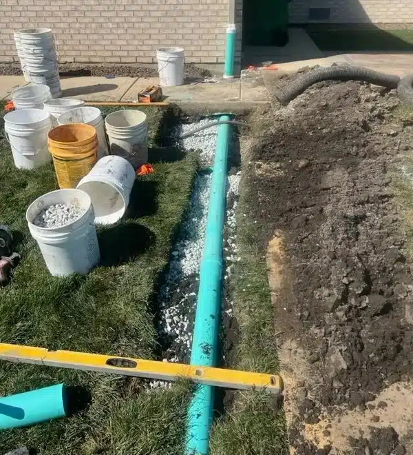 during downspout extension installation