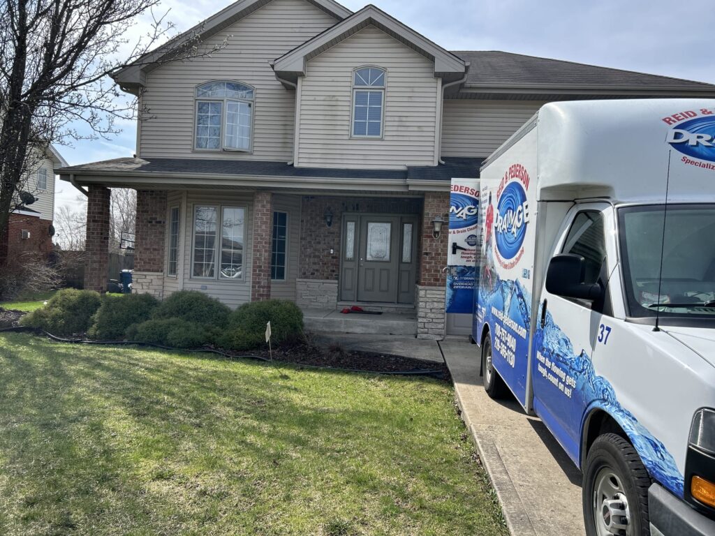customer home and service truck