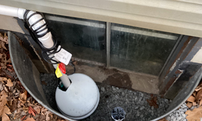 sump pump installation in well window