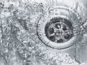 water draining down sink